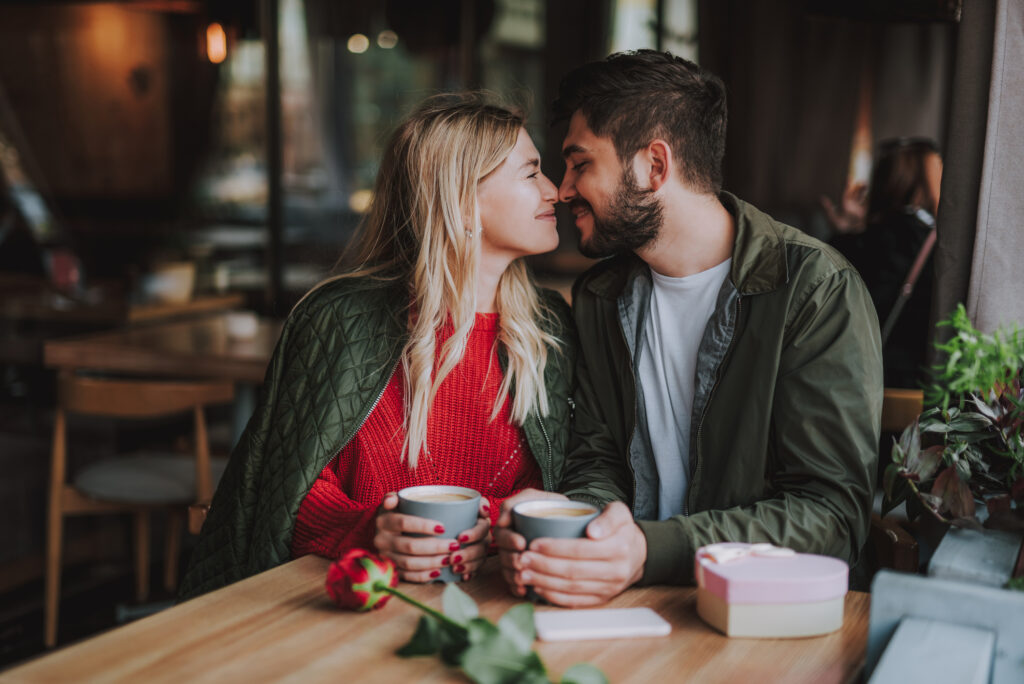 Couple having coffee and building sexual wellness