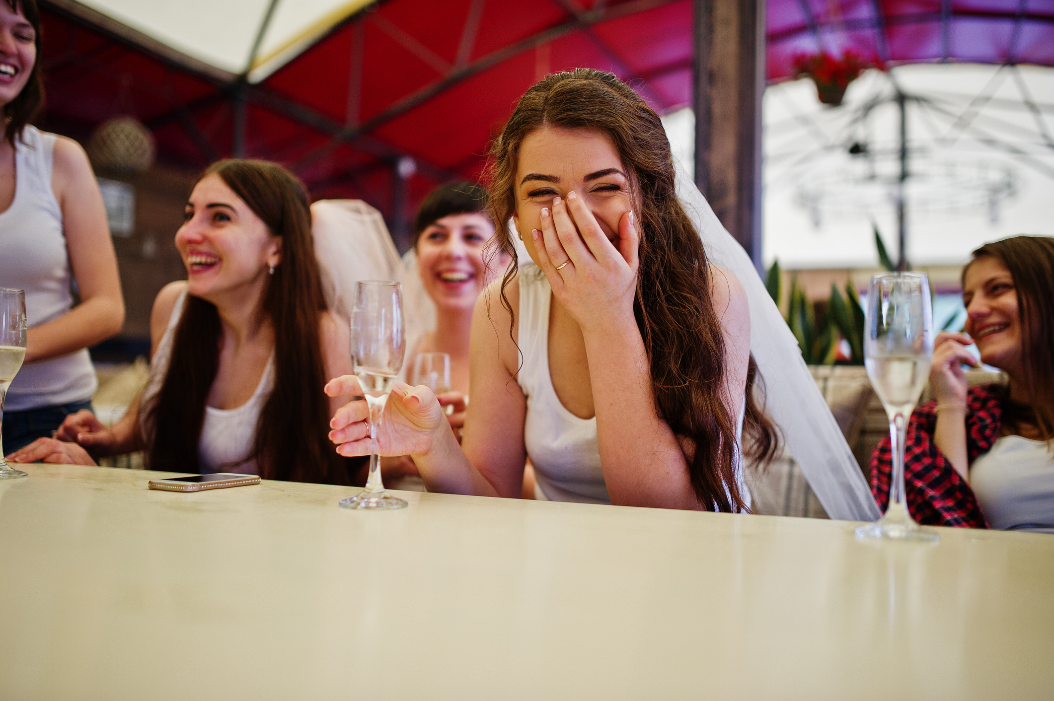 bride laughing at party 